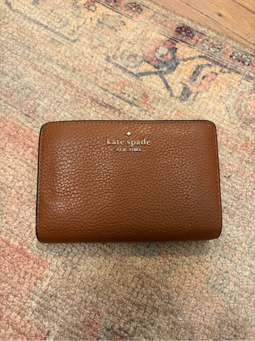 Kate Spade New York brown pebbled leather wallet